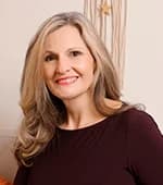 Woman smiling.
